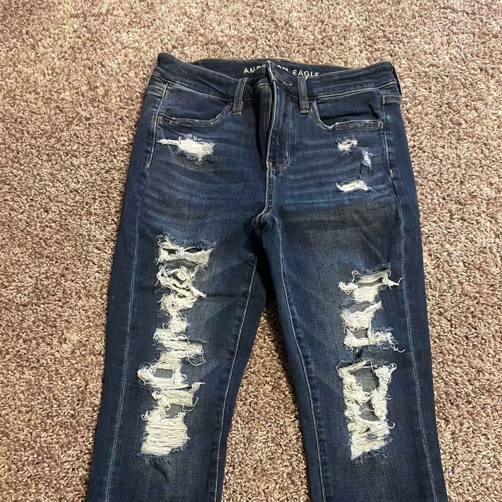 AE size 4 high rise distressed jeans